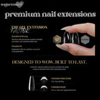 a woman's hand holding a black and white nail