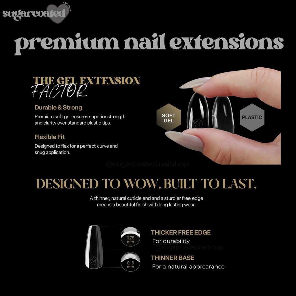 a woman's hand holding a black and white nail